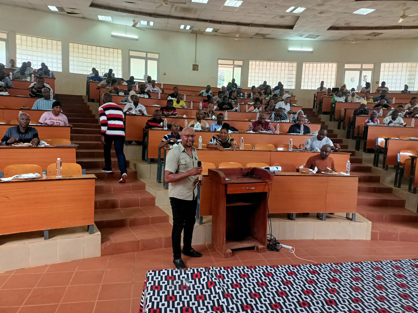 Dr. Eric M. Kioko during a postgraduate workshop on academic writing at Fanon Lecture Theatre, Mzumbe University, Tanzania.