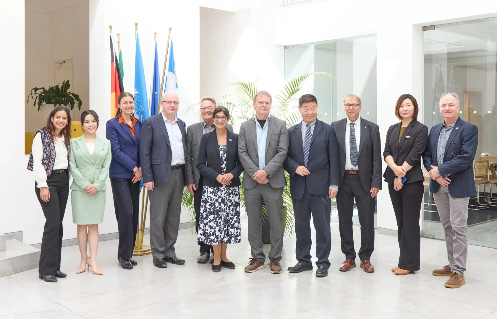 After the signing (from left to right): – Thilanka Seneviratne (UN-SPIDER Bonn/UNOOSA), Flora Zhang (UNOOSA Vienna), Josi Bregulla (ZFL/University of Bonn), Lorant Czaran (UN-SPIDER Vienna/UNOOSA), Prof. Dr. Klaus Greve (ZFL/University of Bonn), Aarti Holla-Maini (Director UNOOSA Vienna), Dr. Michael Schmidt (ZFL/University of Bonn), Dr. Wang Tianyi (IPA), Vice-Rector Prof. Dr. Klaus Sandmann (University of Bonn), Jessica Liang (IPA), and Prof. Dr. Jörg Szarzynski (UNU-EHS – United Nations University, Institute for Environment and Human Security).